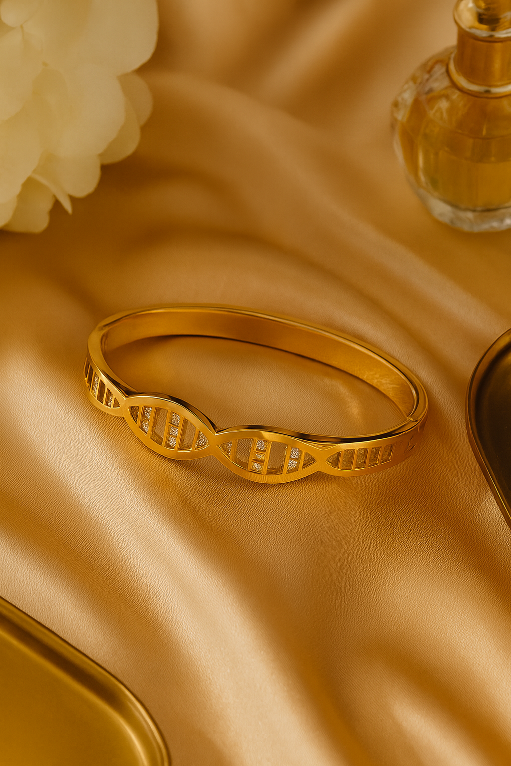 Golden cuff bracelet with geometric, DNA-inspired design
