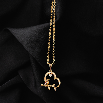 Bird on Heart Shape Branch Pendant
