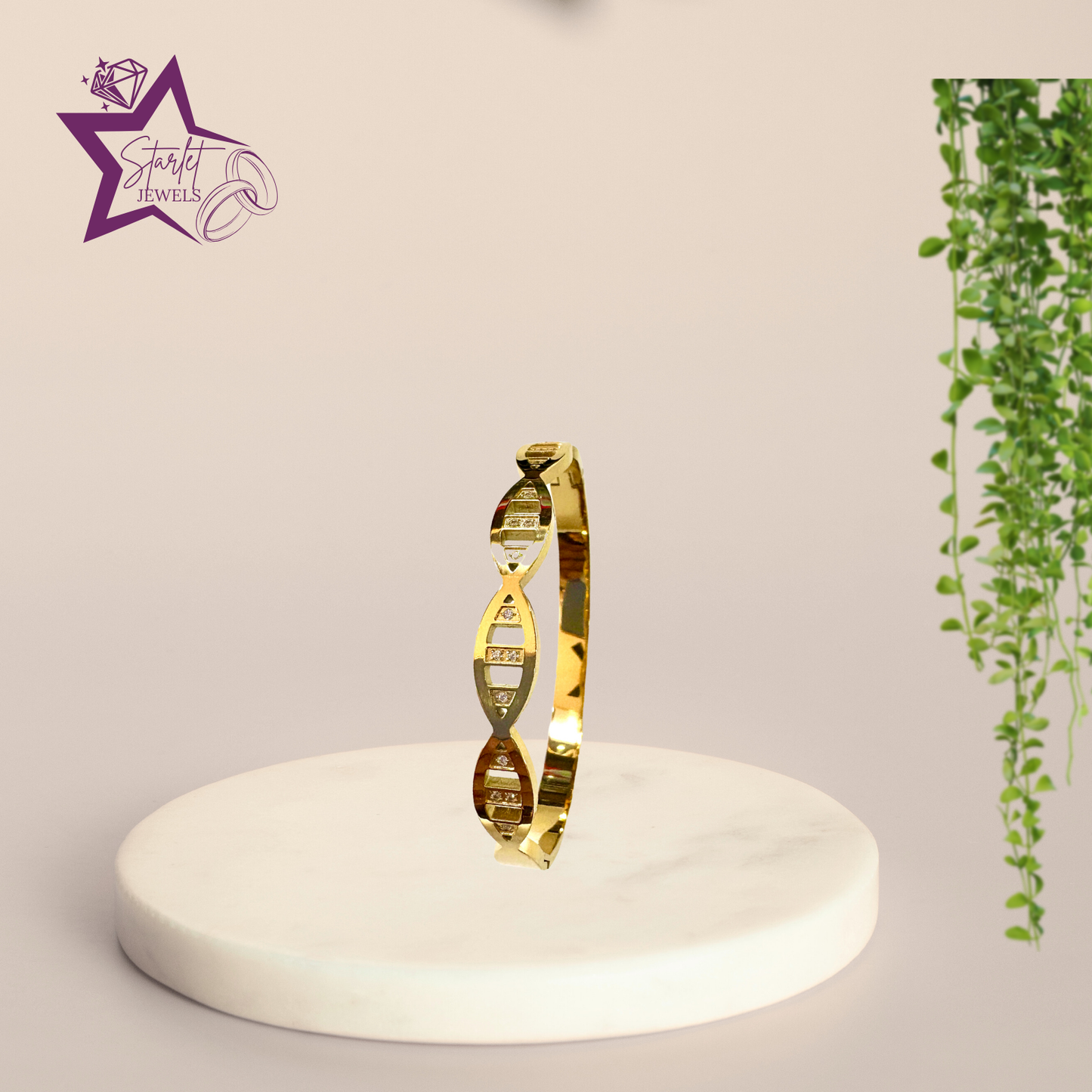 Golden cuff bracelet with geometric, DNA-inspired design